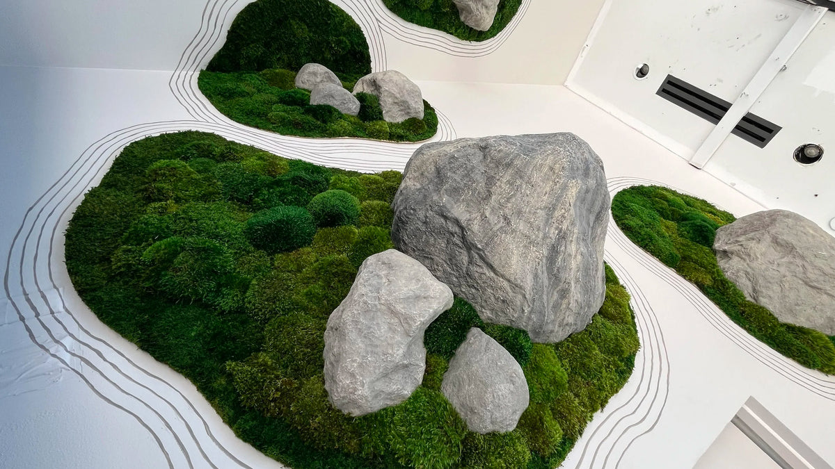 A dry garden, built vertical in moss and stone.