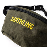 Olive green Earthling bag worn as crossbody