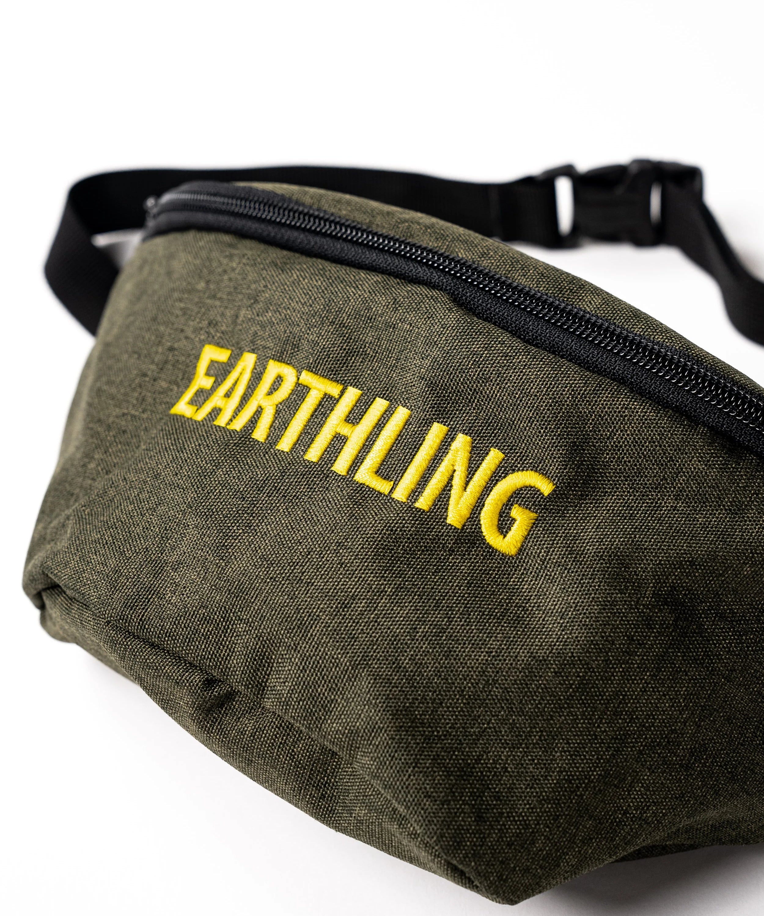 Olive green Earthling bag worn as crossbody