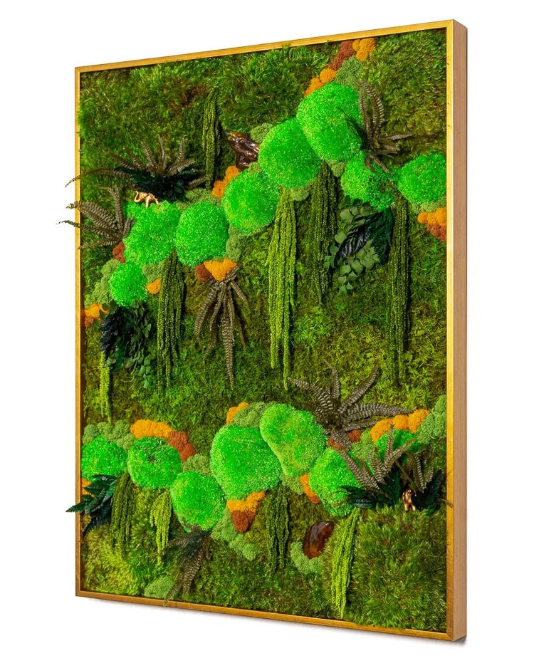 Preserved moss art in a gold frame with mounded moss, ferns and orange accents