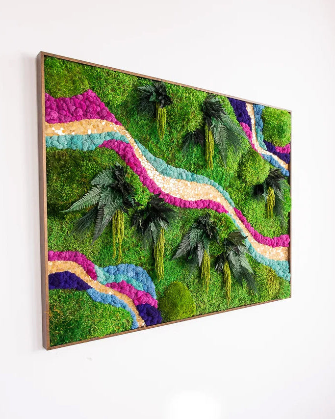 Preserved moss art with winding bands of magenta, teal and cream moss through green moss and ferns